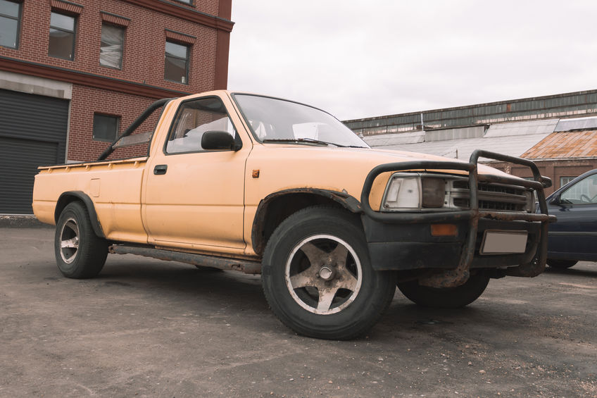 A pickup truck sitting in a parking lot